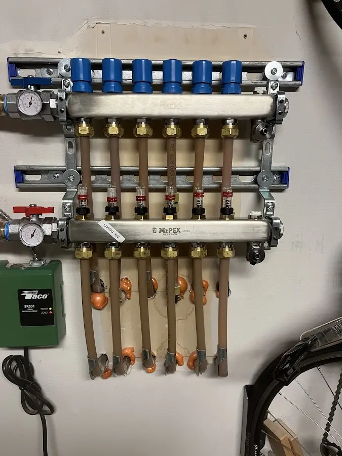 Plumber performing Gas Line Installation at a residential property in Hopkins